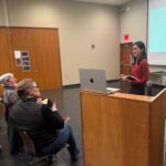 Caption: Landscape architects and COG advisory board members David Jay and Heather Heimarck, offer design feedback and guidance on proposals developed by Jiayu Wu.